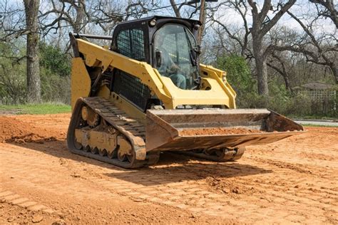 grading a slope with a skid steer|best skid steer for grading.